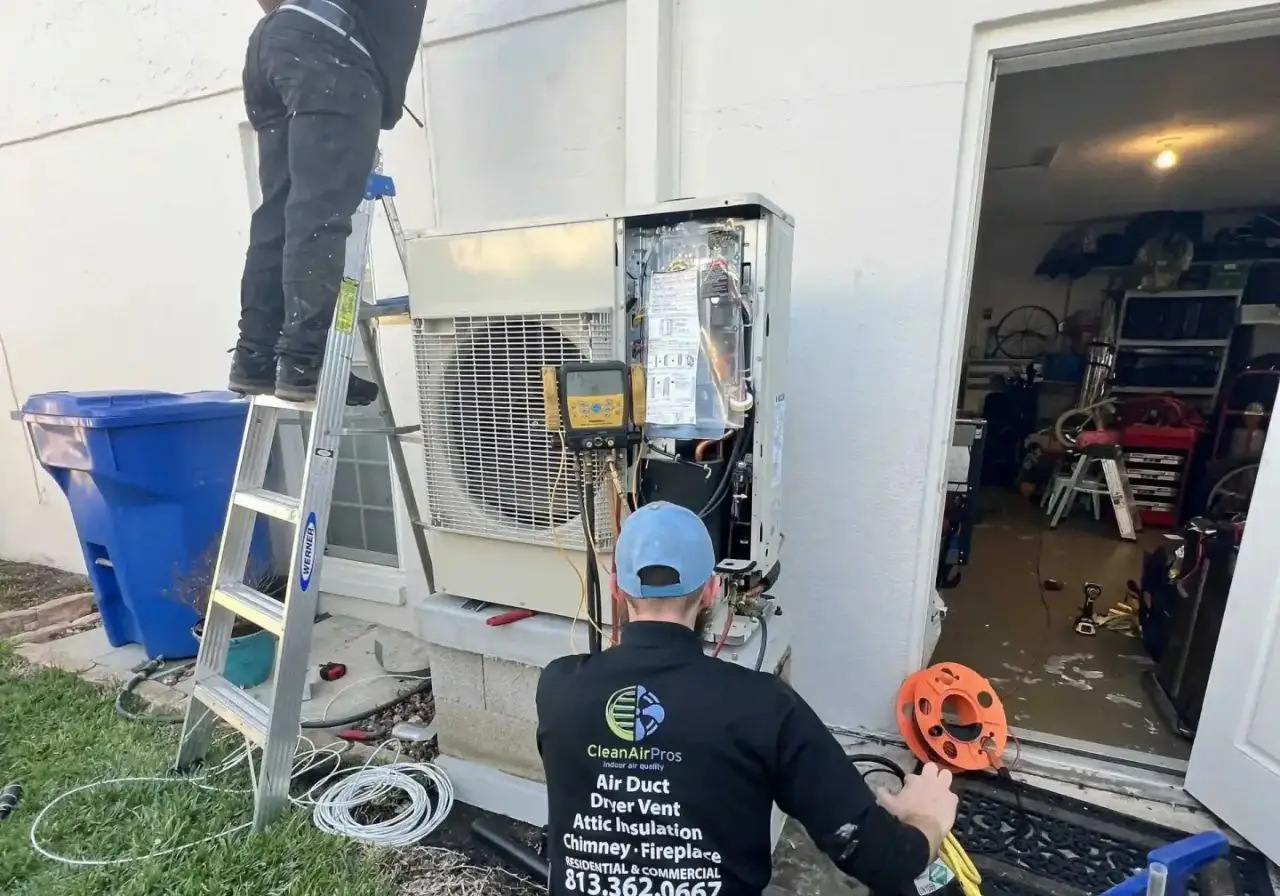 HVAC technician performing a repair on an outdoor air conditioning unit with diagnostic tools, ensuring efficient system performance.