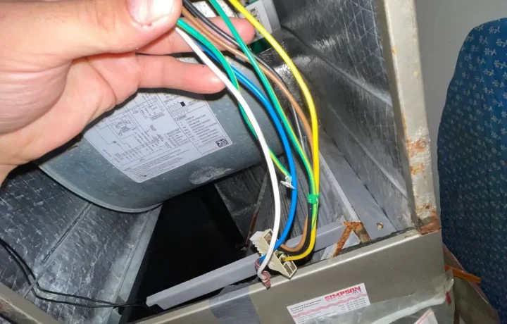 HVAC system installation showing ventilation ducts and connections outside the building.